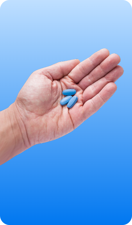 Hand holding pills